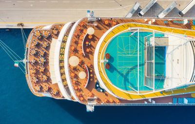 Aerial view of a cruise ship deck with a swimming pool