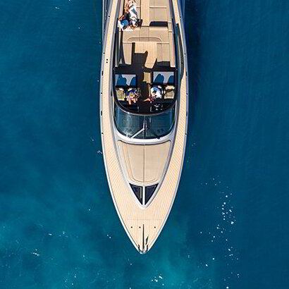 Speedboat seen from directly above on deep blue water